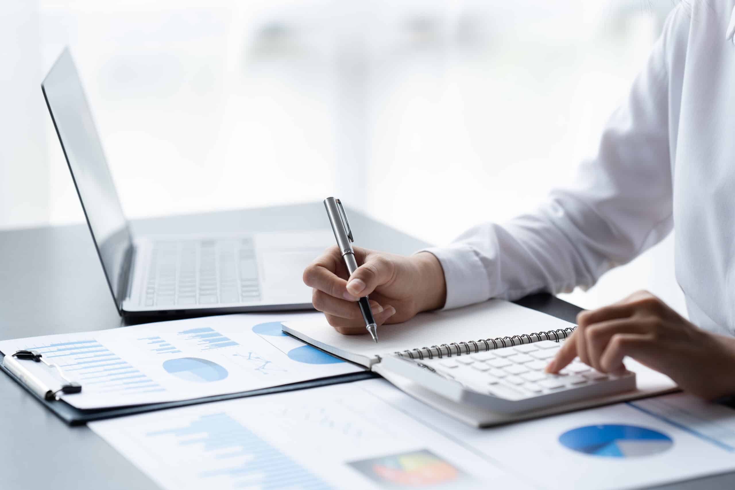 Businessman Accounting Calculating Cost Economic Financial data.